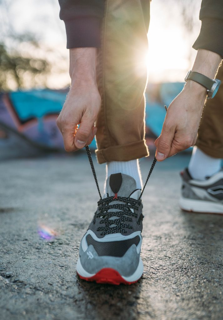mens new balance style sneakers or athletic shoes walking close up